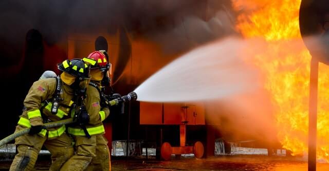 Firefighters taming fire